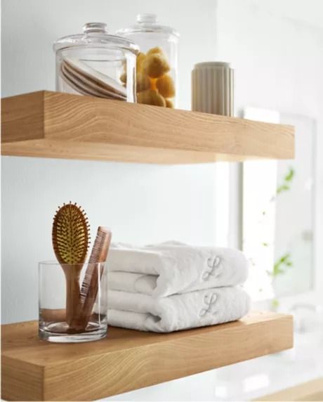 Quiet Luxury Organization with Holly Blakey | Crate & Barrel Open Shelf In Bathroom, Bathroom Shelf Styling, Large Glass Canisters, Bathroom Vibes, Bathroom Details, Wood Floating Shelf, Minimalist Shelves, Modern Bathroom Accessories, White Bath Towels