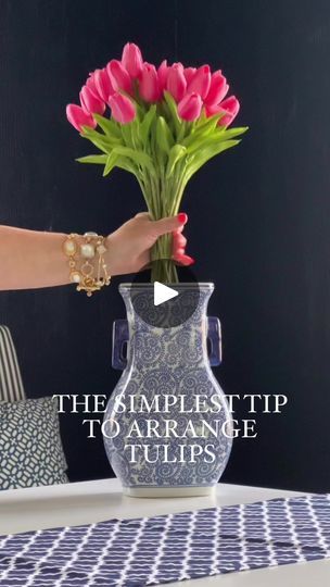 14K views · 269 reactions | If you want your tulips to look like they came straight from the florist?All you need is this simple tip: 🌷Are you ready?Use a straw to extend the length of your tulip stem so they look longer and taller.Yep.A STRAW.For this arrangement I used bendable straws to make it even easier.Add the straw to the stem and then twist and turn the tulips different ways to look like a florist arranged them.These faux tulips LOOK SO REAL, come in so many different colors and there are 20 stems in each package.And in amazing news?They’re on sale right now.🌷🌷🌷🌷Spring never looked prettier. You can see these faux tulips here: https://urlgeni.us/amazon/WMST6 | KariAnne Wood | Ihor Vitsinskyy · Happy Moments Tulip Centerpiece Simple, Faux Tulips, Tulip Centerpiece, So Real, Tall Vases, Happy Moments, Spring Decor, All You Need Is, How To Look Pretty