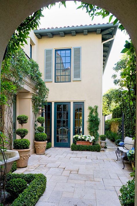 Blue And White Spanish Tile, Dark Teal Exterior, Teal Shutters, Apartemen Studio, Lovely Interior, Interior Courtyard, Stone Pavers, Pintura Exterior, Stucco Exterior