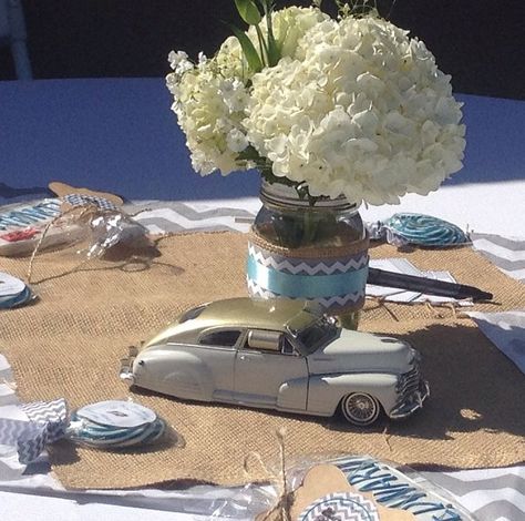 Vintage Car Baby Shower. Using chevron stripes. Lowrider Centerpieces, Classic Car Baby Shower Theme, Vintage Car Baby Shower Theme, Car Baby Shower Theme, Car Centerpieces, Vintage Baby Shower Boy, Vintage Car Party, Boy Shower Themes, Cars Birthday Party Decorations