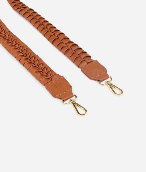 Update your favorite Fawn Design Bag with this braided messenger strap! Its convenient clips make it easy to attach and mix + match it with any of the bags from our Staples Collection or even our limited edition colors! Have fun creating your own combos that fit your style! Made of Certified Top-grade premium faux leather Matte or shiny gold hardware Pairs perfectly with any Fawn Design Bag DIMENSIONS: Size: 45" long, 1.5" wide