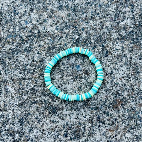 Blue, Yellow, Green And Teal Handmade Clay Beaded Bracelet With A Mix Of All The Colors Together. Clay Beaded Bracelet, Tropical Sea, Sea Colour, Minecraft Ideas, Handmade Clay, Clay Beads, Bead Bracelet, Beaded Bracelet, Blue Yellow