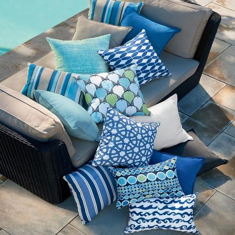 Brighten your patio with outdoor pillows and poufs. Each outdoor pillow is made from fade and weather resistant Sunbrella fabric. Choose from a variety of designs to fit your style. Blue Outdoor Cushions, Navy Blue And Teal Outdoor Patio Decor, Outdoor Pillows Ideas Color Schemes Patio, Outdoor Pillows Ideas Color Schemes Blue, Patio Furniture Color Schemes, Outdoor Fabric Ideas, Outdoor Pillows Ideas Color Schemes, Tiffany Window, Blue Patio Furniture