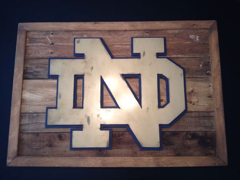 Hand distressed Notre Dame 3-D logo sign. Reclaimed wood sign. 3-D logo sign. Fighting irish wall decor. Hand made by kate Hall Family Cave, Kate Hall, Irish Wall Decor, Noter Dame, Woods Ideas, Irish Wall Art, All About Us, Fine Woodworking Project, Children Pictures