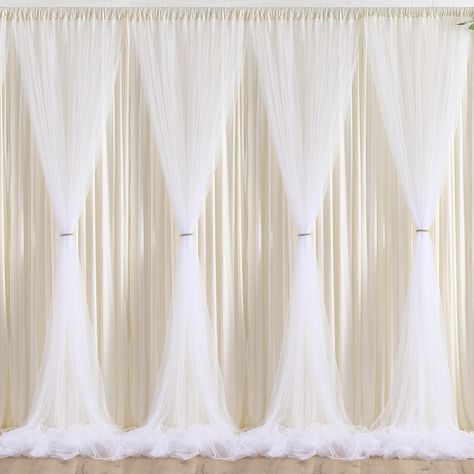 PRICES MAY VARY. Package includes: 6 Panels 5ftx10ft Ivory Backdrop with White Tulle Backdrop Curtains. Totally 30FT(Width) x 10FT(Height). Double Layered Panels: One layer sheer white tulle curtain and One layer Ivory backdrop curtain underlay. Tulle is longer than the back panel. Fluffy Tulle Backdrop Curtains: Created the ruffling effect, makes your party dreamy and wispy. Easy to Hang on, come with 4 inches pocket. Fabric of the Ivory backdrop drapes: Made of Polyester. Wrinkle Free; Thick; Simple Engagement Party Photo Backdrop, How To Drape Curtains, Drapes For Wedding, Ivory Backdrop, Tulle Backdrop, Bridal Backdrop, Backdrop Curtains, Stage Curtains, Birthday Party Photography