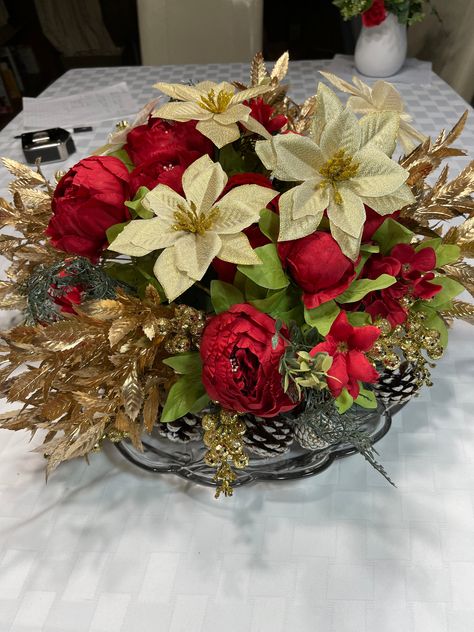 Christmas centerpiece preview. Beautiful antique platter below. Lots of red peonies, Gold Pointsettas gold and red berries, gold leaves, pine cones and more. Renton Washington, Unique Flower Arrangements, Red Peonies, Christmas Centerpiece, Gold And Red, Gold Leaves, Unique Flowers, Pinterest For Business, Vintage Vases