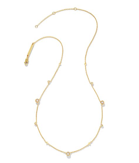 PRICES MAY VARY. Gift your loved one the sleek Kendra Scott Davie Trio Strand Necklace, a unique 18k gold plated neck piece for everyday wear and let her radiate confidence and grace. 18K gold plated metal construction. Trio strand necklace. White sapphire detailing. Lobster clasp closure. Gift your loved one the sleek Kendra Scott Davie Trio Strand Necklace, a unique 18k gold plated neck piece for everyday wear and let her radiate confidence and grace. 18K gold plated metal construction. Trio s Layering Kendra Scott Necklaces, Kendra Scott Necklace, Demi Fine Jewelry, White Necklace, Delicate Necklace, White Sapphire, Strand Necklace, Huggies Earrings, Kendra Scott