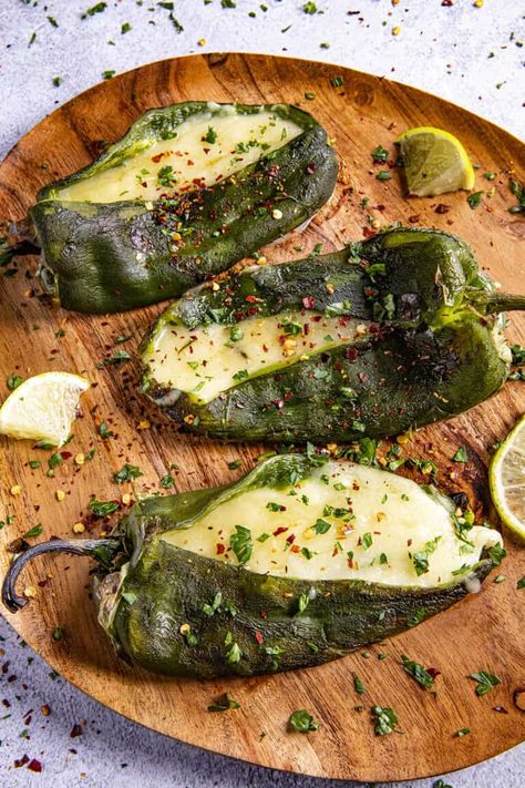 Grilled Cheese Stuffed Poblano Peppers Recipe - A recipe for grilled stuffed peppers with poblano peppers that are filled with cheddar and mozzarella cheeses, then grilled until nice and melty. So delicious! Pablano Pepper Recipe, Cheese Stuffed Poblano Peppers, Grilled Stuffed Peppers, Roasted Chili Peppers, Poblano Recipes, Guisada Recipe, Poblano Peppers Recipes, Chili Pepper Recipes, Roasted Poblano Peppers