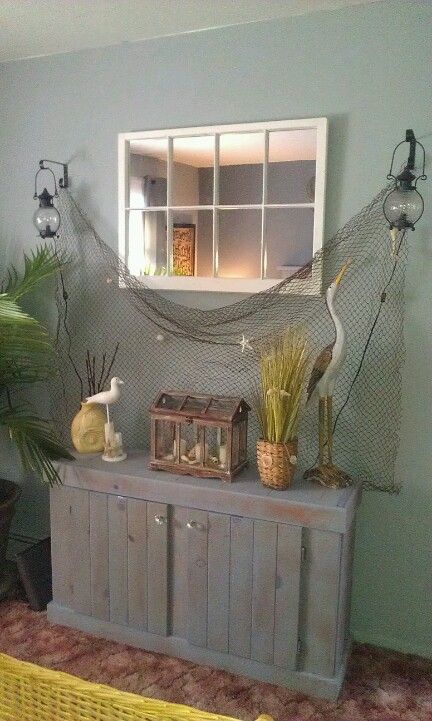 window mirror, 55 gal fish tank stand, tealight  lanterns wired for electric. Things To Do With Old Fish Tanks Ideas, Western Fish Tank Decor, Farmhouse Fish Tank Stand, Beach Themed Fish Tank, Home Made Fish Tank Stands, Aquarium Stands, Cabin Diy, Fish Tank Stand, Tank Stand