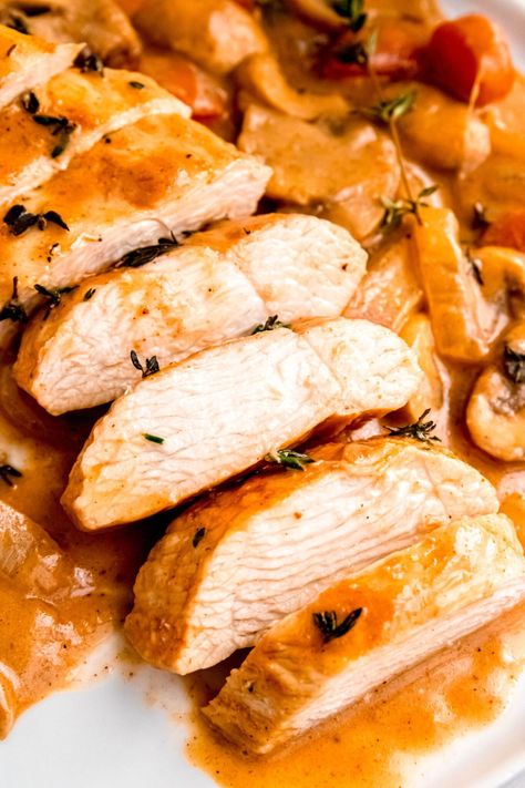 Whip up gourmet in under an hour with this one-pot wonder: Dutch Oven Dijon Chicken Breasts! In just an hour, enjoy a dish that's not only a breeze to make but also to clean up. This recipe blends lean protein-rich chicken, a vibrant mix of veggies, & a lusciously creamy yet light sauce for a meal that's both hearty & healthy. Perfect for busy weeknights or a cozy dinner, it's sure to satisfy & nourish without the heaviness. Get ready for a flavor-packed meal that's as easy as it is delicious! Chicken In The Dutch Oven, Chicken Breast Dutch Oven Recipes, Chicken Breast Dutch Oven, Dutch Oven Chicken Breast Recipes, Oven Chicken Breast, Slow Cooked Chicken Breast, Dutch Oven Chicken Breast, Chicken Breast Oven Recipes, Chicken Breast Oven