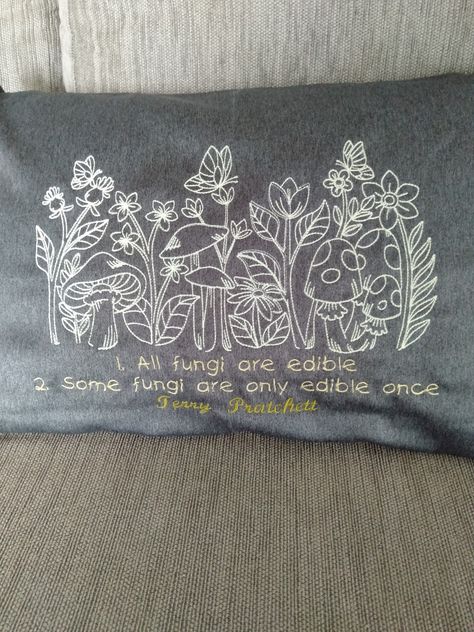 All fungi are edible. Some fungi are only edible once. Fungi in glow in the dark thread. Design link https://www.urbanthreads.com/products.aspx?productid=UT21285 Discworld Embroidery, Thread Design, Glow In The Dark, The Darkest, Craft Projects, Thread, Cushions, Embroidery, Sewing