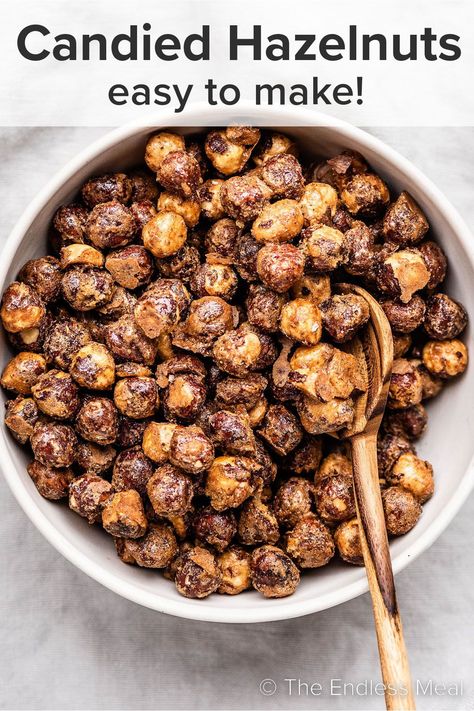 Add these simple candied hazelnuts to salads, treats, and savory dishes for a sweet and nutty crunch. They're easy to make and they're ready in 40 minutes! #theendlessmeal #candiedhazlnuts #hazelnuts #candiednuts #christmas #diy #nuts What To Do With Hazelnuts Recipe, Roasted Hazelnut Recipes Savory, Fresh Hazelnut Recipes, Hazel Nuts Recipes, Hazel Nut Recipes Food, Hazelnut Recipes Savory, Recipes With Hazelnuts Easy, Hazelnut Recipes Healthy, Candied Hazelnuts Recipe