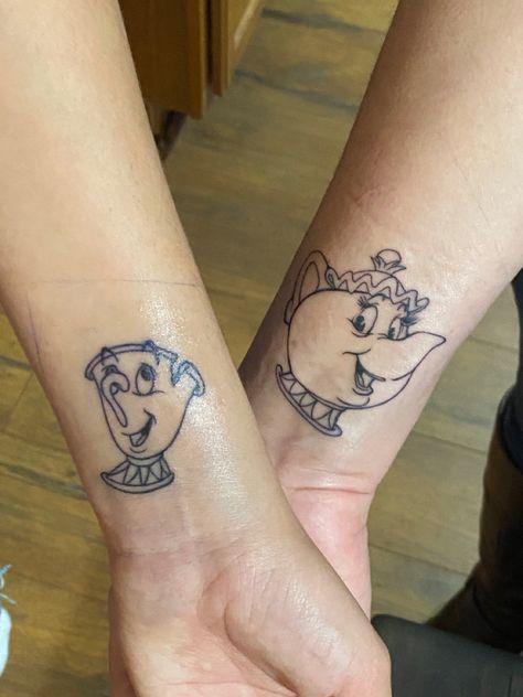 disney’s beauty & the beast chip & mrs. potts black ink wrist tattoo Chip And Mrs Potts Tattoo, Mrs Potts Tattoo, Mrs Potts And Chip Tattoo, Chip Tattoo, Mrs Potts, Disney Tattoo, Disney Tattoos, Tattoo Ideas, Tattoos