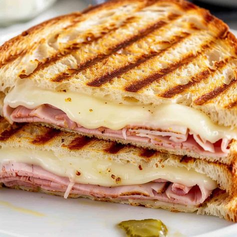 Skip your coffee run and make this Starbucks ham and Swiss panini at home! It's quick, easy, and tastes just like the real deal. Starbucks Ham And Swiss Baguette, Ham And Swiss Panini, Ham And Swiss Sandwiches, Starbucks Sandwiches, Cheese Panini, Savoury Slice, Ciabatta Roll, Ham And Swiss, Panini Recipes