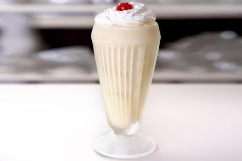 This vanilla malted milk shake is lower in fat than an ice cream-parlor version, thanks to reduced-fat ice cream and milk. But malt powder still gives this vanilla malted milk shake its requisite richness. Malt Milkshake, Martin Lewis, Vanilla Milkshake, Vanilla Shake, Vanilla Milk, Malted Milk, Jerry Lewis, Milkshake Recipes, Milk Shake