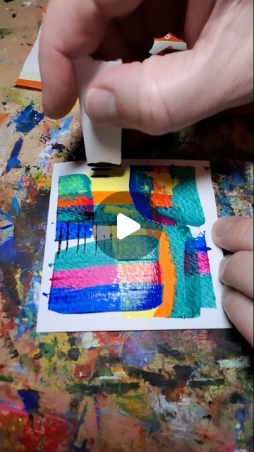 Chris Webb on Instagram: "I'm with you...
~
The video shows a small abstract painting being made. The canvas features an abstract painting with vibrant colors and bold brush strokes. The colors include blue, teal, pink, red, orange, yellow, and green. There are also black lines and drips that add texture and contrast to the composition. The background is a workspace with a wooden surface that has paint splatters, and there are some shelves and papers visible in the background." Small Abstract Painting, Paint Splatters, Black Lines, Red Orange Yellow, Yellow And Green, Blue Teal, Paint Splatter, School Activities, Orange Yellow