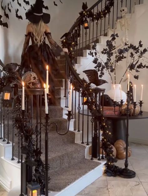 Transform your home into a haunted haven with over 80 creative and creepy Halloween decoration ideas. From eerie lighting to spooky DIY crafts, we've got you covered! #HalloweenDecor #IndoorDecor #SpookySeason #halloween #halloweendecoration #halloweenhomedecor #falldecor #tjmaxxfinds Halloween Witches House Decorations, Halloween Archway Indoor, Halloween Party Ambiance, Halloween Banister Ideas, Witchy Backdrop Ideas, Halloween Stairs Decor, Staircase Halloween Decor, Halloween Entryway Decor Indoor, Witch Cottage Decor