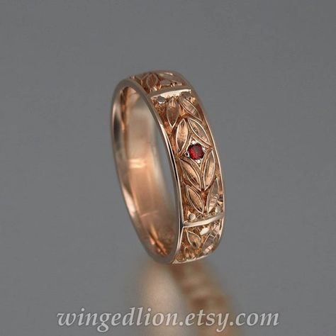 EVERGREEN LAUREL wedding band is adorned with beautiful carvings and features a comfortable shank. It will be made of 14K rose gold in the size specified by the customer. Its 5.7mm wide. It was created as a mens band, but the design is unisex. Please specify size when ordering. The band is adorned Garnet Wedding Rings, Garnet Wedding, Antique Wedding, Rose Gold Wedding Bands, Dope Jewelry, Pretty Rings, Black Rhodium, Gold Wedding Rings, Mens Wedding Rings