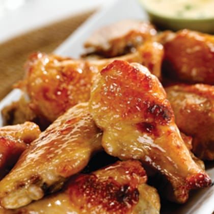 Grilled Chicken Drumsticks with Pineapple Sriracha Glaze - Sanderson Farms Sweet And Sour Chicken Wings Recipe, Sweet And Sour Chicken Wings, Baked Hot Wings, Honey Chipotle Chicken, Farm Recipes, Sweet And Sour Chicken, Honey Chipotle, Honey Garlic Sauce, Sweet N Sour Chicken