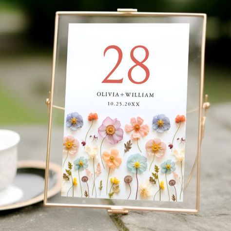 Retro Pastel Pink Boho Wildflower Wedding Details Table Number Gold And Pastel Wedding, Bright Vintage Wedding, Wildflower Meadow Wedding, Wild Flower Wedding Theme, Pastel Wedding Decor, Pink Garden Wedding, Boho Wildflower Wedding, Wedding Table Signage, Table Number Ideas