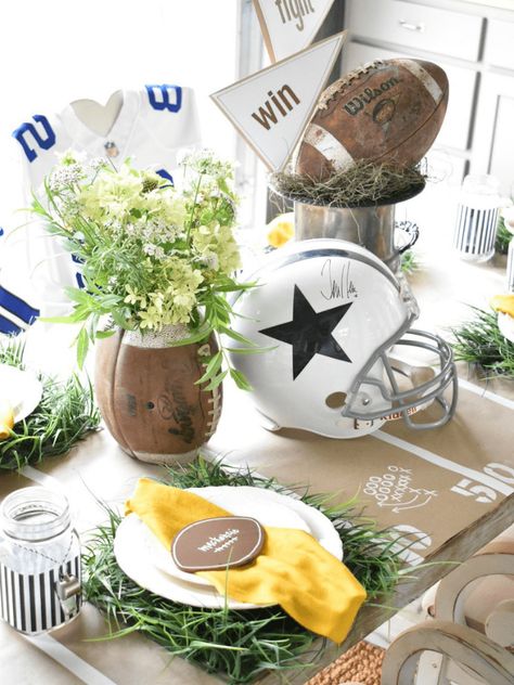 I had so much fun creating this football themed tablescape for my dinner club this month! I used lots of things I already had on hand and got creative with ways to use them for this tablescape. A memorobilia football helmet that my husband had, an old football, a yellow scarf turned into "penalty" flag napkins, and black/white striped paper and whistles to create "referee" glasses made perfect accents for my table. Read along and I'll show you how I created this tablescape on a budget. Tailgating Decor, Planning Sport, Football Centerpieces, Football Tailgate Party, Football Watch Party, Football Banquet, Football Birthday Party, Football Tailgate, Dinner Club