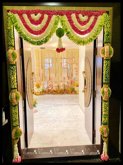 Pooja Door Flower Decoration, House Entrance Flower Decoration, Flower Decoration For Door Entrance, Main Door Decoration Ideas With Flowers, Door Decorations Flowers Entrance, Flower Decoration For House Warming, Rakshabandhan Decoration Ideas, Main Door Decoration Ideas Indian, Entrance Door Flower Decoration Indian