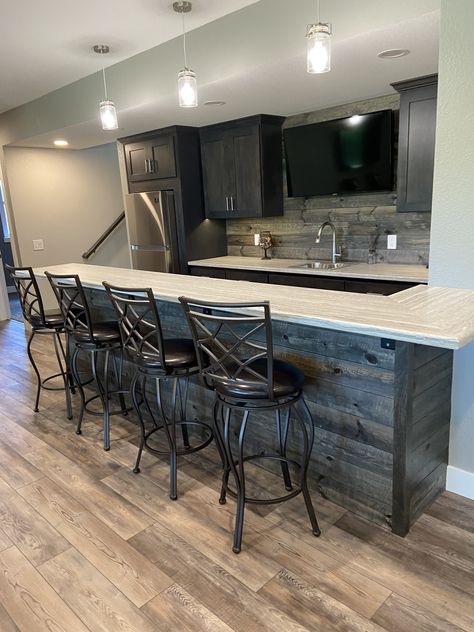 L Shaped Home Bar Designs, Basement With Bar Ideas, Wet Bar With Seating Area, Basement Wet Bar With Tv, Basement Bar And Living Room Ideas, U Shaped Basement Bar, Bar Ideas For Home Basement Modern, Basement Bar With Island, L Shaped Bar Basement