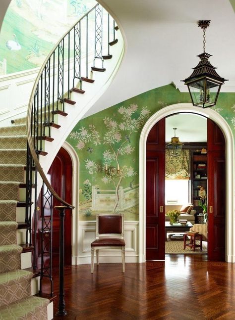 Ashley Whittaker. Architect Tom Felton rebuilt a modifed version of the circular entry hall’s sweeping staircase, a distinctive feature of the circa-1927 J.E.R. Carpenter interior. The Charles Edwards pagoda-shaped lantern plays off the hand-painted Chinoiserie-inspired wallpaper from Gracie Studio. Sconces, Chameleon Antiques. Stair runner, Stark. New York Spaces, May 2013. Wallpaper Entryway, Ashley Whittaker, Foyer Wallpaper, Wallpapered Entryway, Gracie Wallpaper, Park Avenue Apartment, Wallpaper Interior Design, Wallpaper Interior, Hand Painted Wallpaper