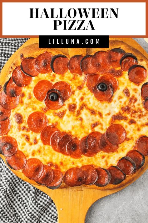 This delightful Halloween pizza is shaped like a smiling jack-o-lantern, perfect for all of your spooky festivities! #halloweenpizza #halloween #pizza #pepperonipizza Halloween Pizza Recipes, Ghost Pizza, Olive Oil Pizza, Pumpkin Pizza, Halloween Pizza, Meatballs And Rice, Fall Goodies, Leftover Pizza, Pizza Sauce Homemade