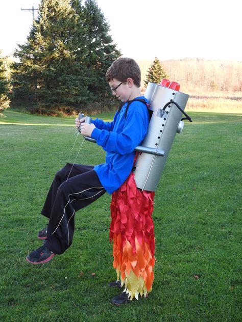 Rocket backpack costume! Book Week Costume Ideas 2023, Diy Rocket Costume, Invisible Man Costume, Rocket Backpack, Illusion Costumes, Fancy Dress Costumes Kids, Reindeer Costume, Clever Halloween, Clever Halloween Costumes