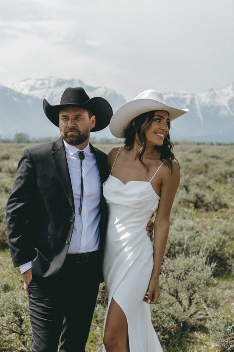 A Rocky Mountain Elopement in Jackson Hole | Rocky Mountain Bride Engagement Western Photos, Western Bride Outfit, Photographs Idea, Bride Cowgirl Hat, Wedding Powerpoint, Western Weddings, Rocky Mountain Elopement, Prairie Wedding, Cowboy Chic