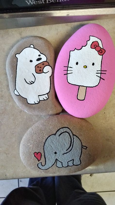 Painted rocks Owl Painted Rocks Easy, Hello Kitty Rock Painting, Hello Kitty Painted Rocks, Cartoon Painted Rocks, Cute Stone Painting, Panda Rock Painting, Disney Rock Painting Ideas, Rock Painting Supplies, Elephant Rock