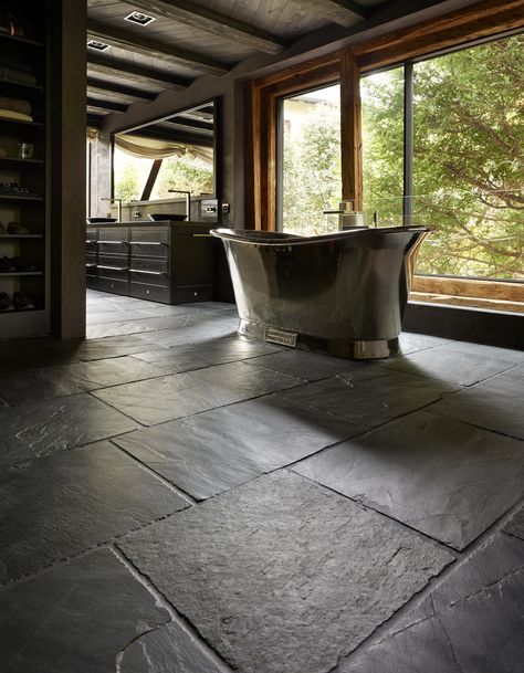 Martin Moore’s stone division completed the project with stone floors and wall cladding throughout the house and garden.  The master bedroom suite features dramatic black slate floors, shower cubicles are finished in split-faced slate and the guest bathroom has a striking monochrome floor in bands of marble and slate. Slate Interior Design, Slate Bathroom Floor, Slate Interior, Black Slate Floor, Slate Bathroom, Slate Floors, Slate Tile Floor, Brick Floor, Stone Floors