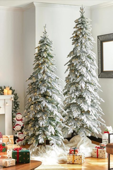 Pre-lit Christmas Tree, Downswept Christmas Tree Decorated, Christmas Decor On Chandelier, Christmas Tree Room Ideas, Christmas Tree In A Planter, 3 Christmas Trees Grouped Together, Pencil Flocked Christmas Tree, Flocked Pencil Tree Decorating Ideas, Neutral Christmas Tree Ideas