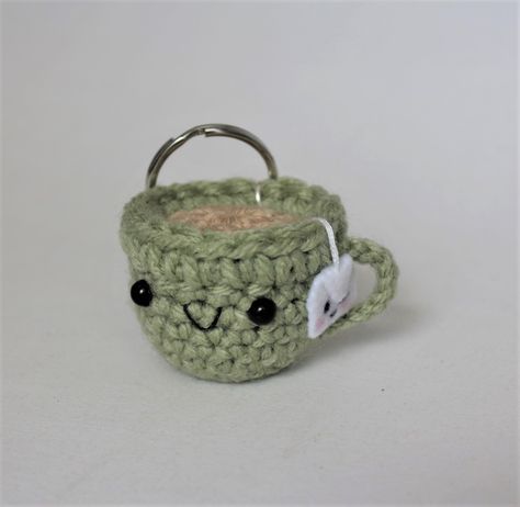 #TejidosPR #Crochet #Amigurumi #TeaCup #Tea Crochet Keyring Free Pattern, Crochet Tea Cup, Coffee Keychain, Wool Crafts Diy, Knitting Gloves Pattern, Diy Crochet Top, Crochet Case, Gloves Pattern, Crochet Shop