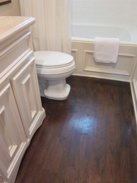 want this color floor as a contrast to my honey pine wood I alreay have all over my house Vinyl Plank Flooring Bathroom, Hardwood Floors In Bathroom, Dark Wood Floor, Dark Oak Flooring, Dark Wood Bathroom, Wood Floor Bathroom, Luxury Vinyl Planks, Vinyl Planks, Hardwood Floors Dark