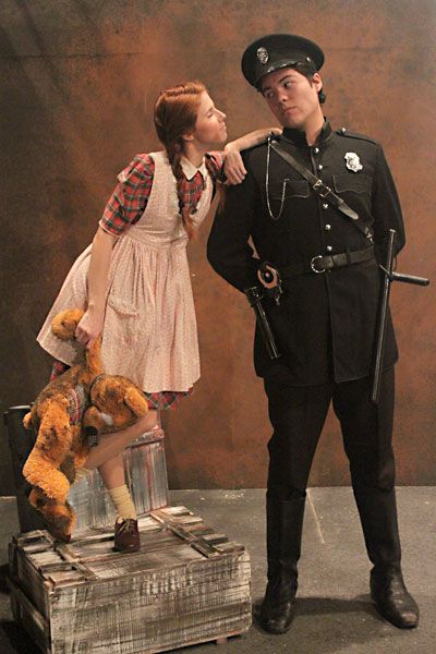 Little Sally (Sydney Roberts) consults Officer Lockstock (Gabriel Bernal) about exposition in <i>Urinetown</i>. Annie Costume, Annie Musical, Theatre Decorations, Musical Theatre Costumes, Broadway Costumes, Billy Elliot, To Pee, Theatre Geek, Tom Sawyer