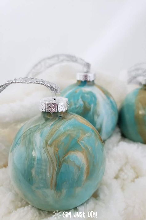 These are just beautiful, aren't they? You can totally customize to your favorite colors and decor. Acrylic Pour Christmas Ornaments, Acrylic Pour Ornaments, Paint Pour Ornaments, Fun Christmas Decor Ideas, Small Votive Candle Holders, Easy Diy Christmas Ornaments, Clear Glass Ornaments, Diy Christmas Ornaments Easy, Clear Ornaments