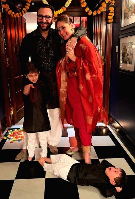 Bollywood actress Kareena Kapoor Khan, who was last seen in 'Laal Singh Chaddha', had an eventful Diwali this year with her family and her social media pictures cement the same.Kareena took to her Instagram to share festive pictures of her family. Her two sons - Taimur and Jeh can be seen in the pictures along with her husband Saif Ali Khan. In one of the pictures, while everyone looks decked up in Indian ethnicwear, the couple's second son Jeh can be seen throwing tantrums as he lies on the flo Kareena Kapoor Saif Ali Khan, Kareena Kapoor And Saif Ali Khan, Saif Ali Khan And Kareena Kapoor, Kareena Kapoor Baby, Jeh Ali Khan, Kareena Kapoor Son, Diwali Pics, Bridal Boutique Interior, Throwing Tantrums