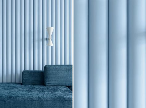 Designed as a way of adding texture to the room, this soft blue accent wall is made from panels that have ribbed finish, allowing the natural light to create ever-changing shadows on the wall. #SoftBlueInterior #BlueAccentWall #TexturedAccentWall #InteriorDesign #Blue #LivingRoom Ribbed Furniture, Soft Wall Panels, Ribbed Wall, Blue Feature Wall, Blue Accent Wall, Interior Accent Wall, Upholstered Wall Panels, Blue Accent Walls, Light Blue Walls