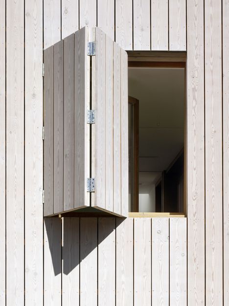 Modern wood clad window shutter | White-stained larch cladding covers window opening | Hampstead Beach House extension in London by Hayhurst & Co. Wooden Window Shutters, Larch Cladding, House Cladding, Window Detail, Hampstead Heath, Wood Architecture, Wood Cladding, Wood Shutters, Casa Container