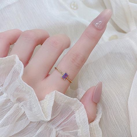 Who else is a fan of purple? Amethyst adds a magical and calming vibe to any outfit! 💜✨ . . . #jewelry #ootd #fashion #earrings #ring #aesthetic #purple #amethyst #whimsical #necklace #daintyjewelry #jewellery Gold Amethyst Ring, Rings Bands, Purple Gems, Romantic Jewellery, Silver Lights, Gem Ring, Wedding Band Sets, Zircon Ring, Vintage Purple