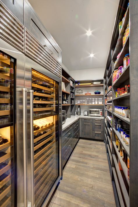 This state of the art walk in pantry includes ample storage, dual wine refrigerators, a Caesarstone  countertop for extra work space, and plenty of open shelving for dry foods storage. Luxury Pantry, Walk In Pantry Ideas, Home Pantry, Pantry Layout, Dream Pantry, Pantry Room, Desain Pantry, Kitchen Organization Pantry, Kitchen Pantry Design