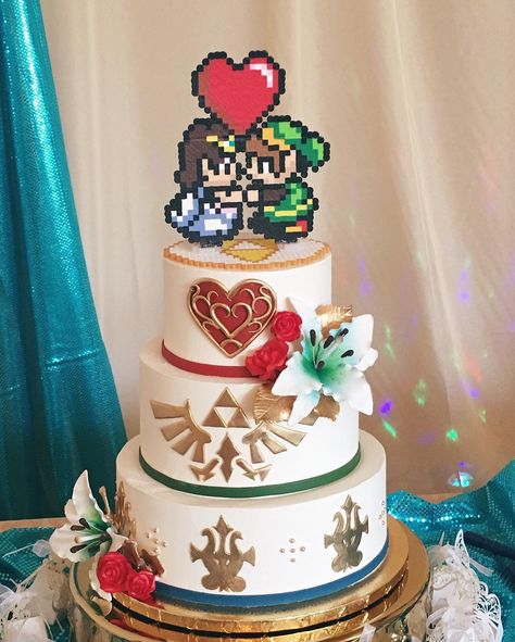 Zelda themed wedding cake? Yep we can do that! #zeldacake #nerdywedding Nerdy Cake Topper, Legend Of Zelda Wedding Cake, Geeky Wedding Cake, Video Game Wedding Cake, Nerdy Wedding Cake Toppers, One Piece Wedding Cake, Wedding Cake Gamer, Kingdom Hearts Wedding Cake, Legend Of Zelda Themed Wedding