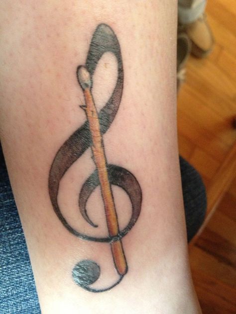 Small Tattoos Music, Drum Stick Tattoo, Tattoo Designs Music, Drummer Tattoo, Notes Tattoo, Wrist Tattoos Words, Drum Tattoo, Stick Tattoo, Music Notes Tattoo