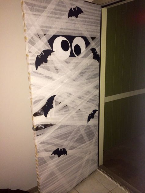 Mummy Door Decoration Hollowed Door Decorations, Simple Halloween Door Decorations, Halloween Door Contest Ideas Classroom, Mummy Decorations Halloween, Mummy Doors For Halloween, Mummy Door Decoration, Mummy Classroom Door, Mummy Halloween Door Decorations, Monster Door Decoration