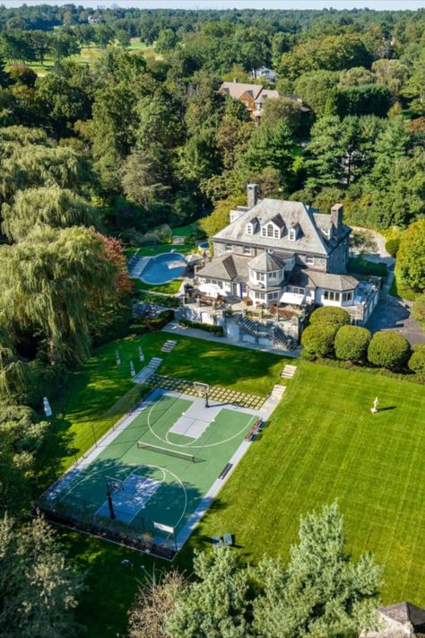 This grand stone manor in Harrison, New  York,that was once owned by Johnny Carson offers a full suite of amenities that rivals the nearby Westchester Country Club, from a pickleball court to an ice cream bar and EV charging stations.  After renting nearby, Carson and his wife bought the home in 1959 and lived in it for one year. His “Tonight Show” sidekick, Ed McMahon, lived about a mile away in Rye. Ed Mcmahon, New York Mansion, Rye New York, Ice Cream Bar, Ev Charging Stations, Johnny Carson, Pickleball Court, Charging Stations, Ev Charging