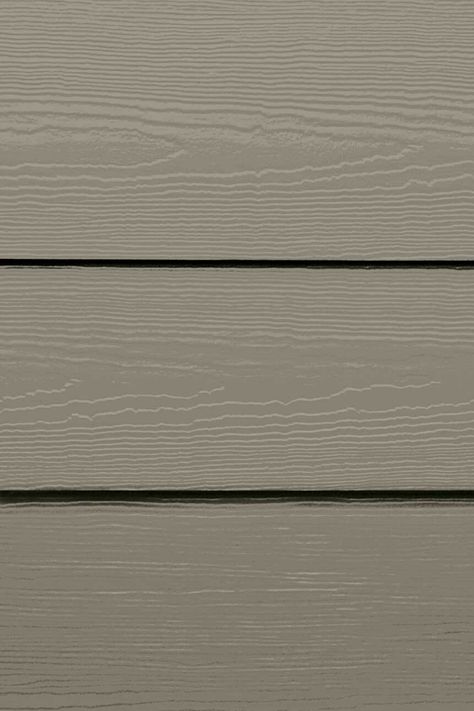 A taupe-based color with darker undertones, Monterey Taupe offers a sophisticated and striking neutral. Click to explore this color or request a sample. Mushroom Color Siding, Monterey Taupe Exterior, Monterey Taupe Hardie Board, Greige Siding, Hardie Monterey Taupe, Taupe House Exterior, Taupe Siding, Hardie Board Siding Colors, Outside Paint Colors