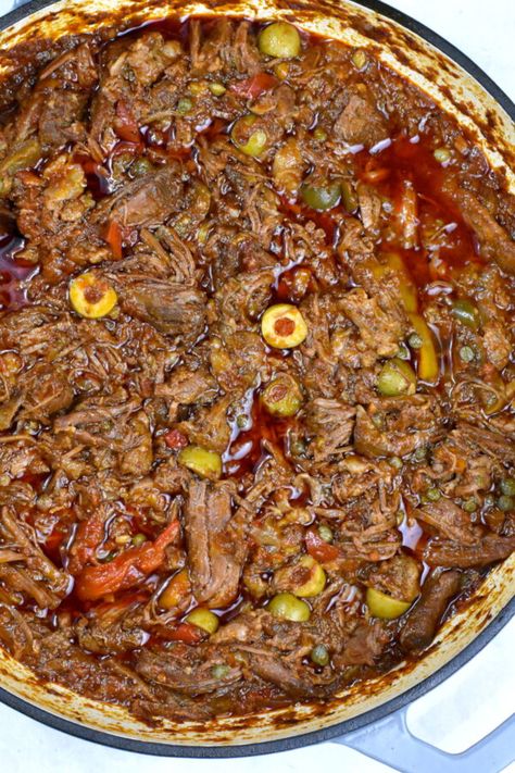 Ropa Vieja (Cuba's National Dish) - GypsyPlate Ropa Vieja Recipe, Cuban Dishes, Cuban Cuisine, National Dish, Shredded Beef, Cuban Recipes, Flavor Enhancers, Latin Food, Caribbean Recipes