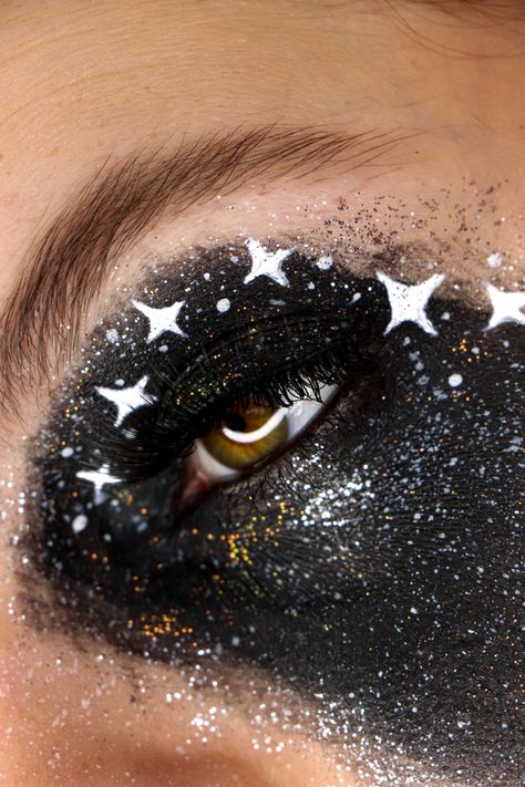 Black and white eye makeup. Galaxy, stars, universe, glitter, face paint and liner. Magical makeup. Black Hole Makeup, Black And White Eye Makeup, Galaxy Eye Makeup, Glitter Face Paint, Eye Face Painting, White Eye Makeup, Black And White Makeup, White Galaxy, Stars Universe